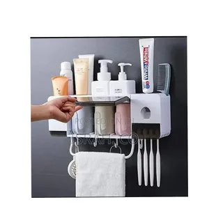 Toothpaste Dispenser and Toothbrush Holder.