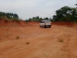 1acre Hoima Road Touching Tarmac at Kakiri