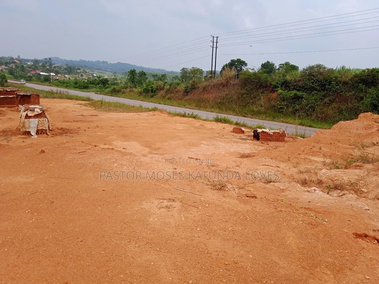 1acre Hoima Road Touching Tarmac at Kakiri