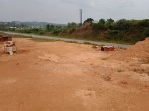 1acre Hoima Road Touching Tarmac at Kakiri
