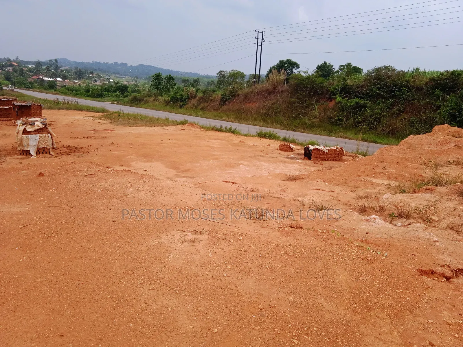 1acre Hoima Road Touching Tarmac at Kakiri