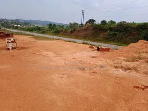 1acre Hoima Road Touching Tarmac at Kakiri