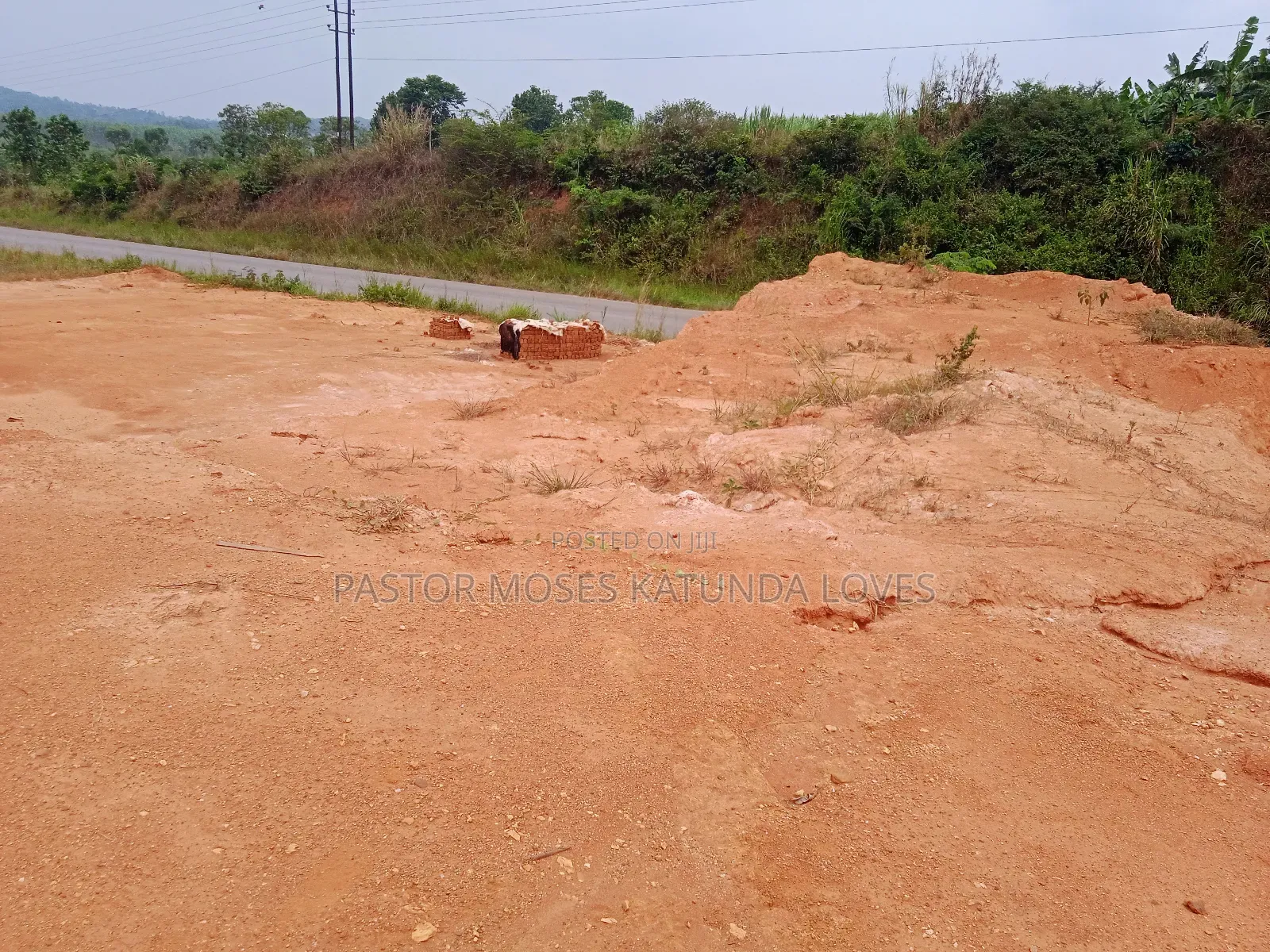 1acre Hoima Road Touching Tarmac at Kakiri