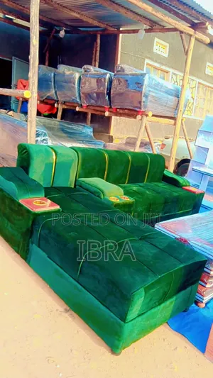 A Shinny Green Cambinated Corner Sofa