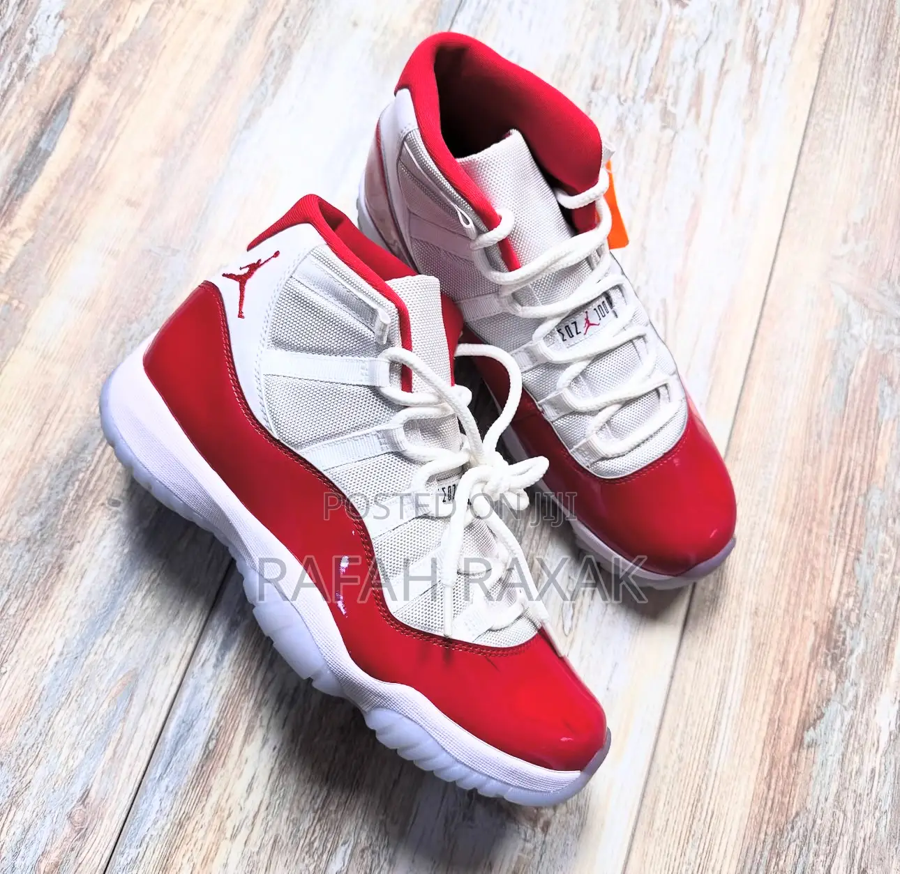 Original Air Jordan 11 Retro “Cherry” Varsity Red Sneakers