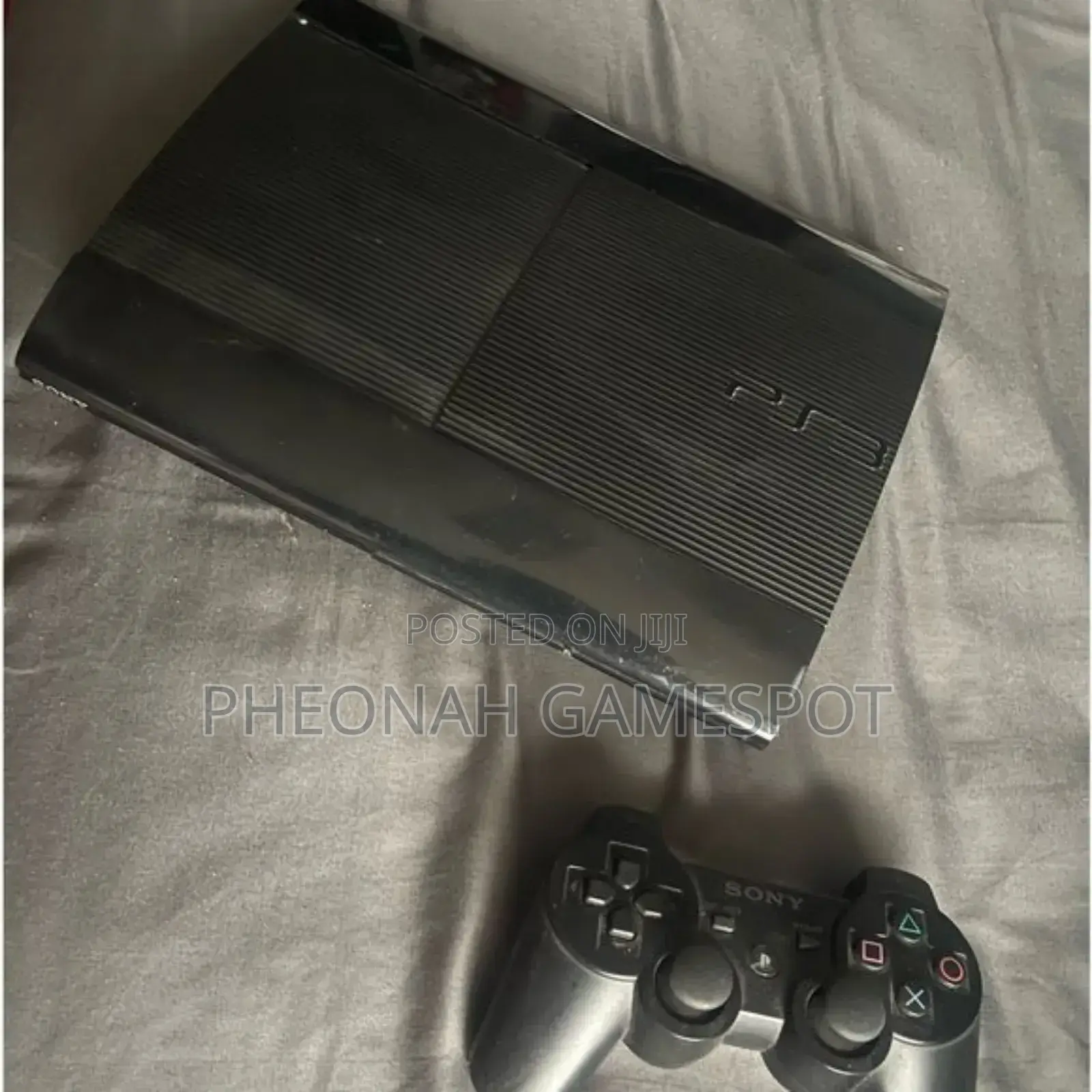 Sony Playstation 3 Super Slim. With 20 Games and 2 Controllers