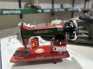 New Bother Sewing Machine Red in Colour Complete With Local Stand