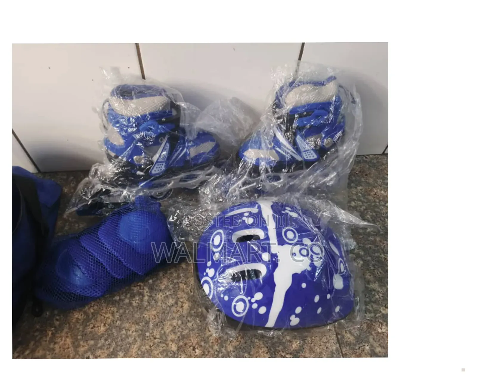 A Pair of Roller Skate Shoes With Helmet and Protective Gear