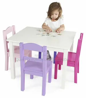 4 Coloured Chairs With a Table
