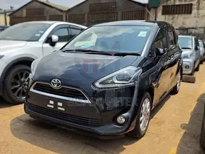 Toyota Sienta 1.5 AWD (6-seater) 2016 Beige