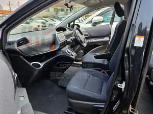 Toyota Sienta 1.5 AWD (6-seater) 2016 Beige