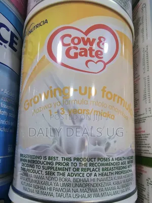 Baby Milk Cow and Gate Milk Powder Tin