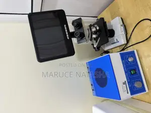 A Set of a Trinocular Microscope With a 6 Buckets Electric Centrifuge