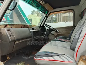 Taala Nya Isuzu Elf