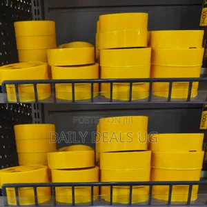 Multiple Rolls Of Yellow Tape