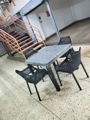 4 Seater Plastic Table and Egypt Armed Chairs Plastic