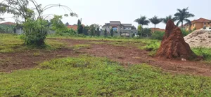 Buwate Najjera Plot for Sale Road at 235m . It's 25 Decimals