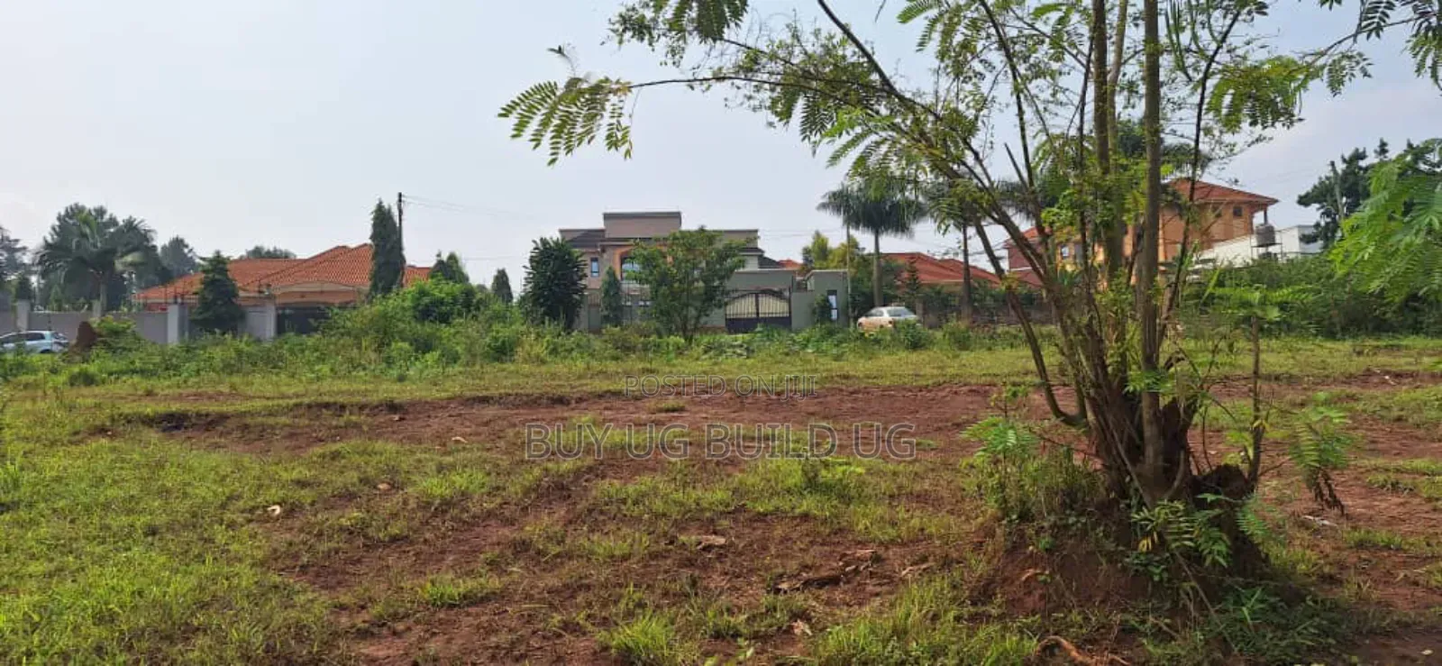 Buwate Najjera Plot for Sale Road at 235m . It's 25 Decimals
