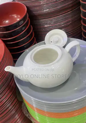 A Round Ceramic Tea Pot Kettle