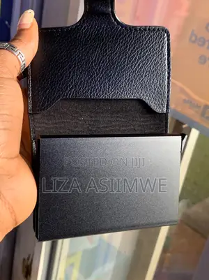 Compact Leather Cardholder or Wallet With a Snap Closure