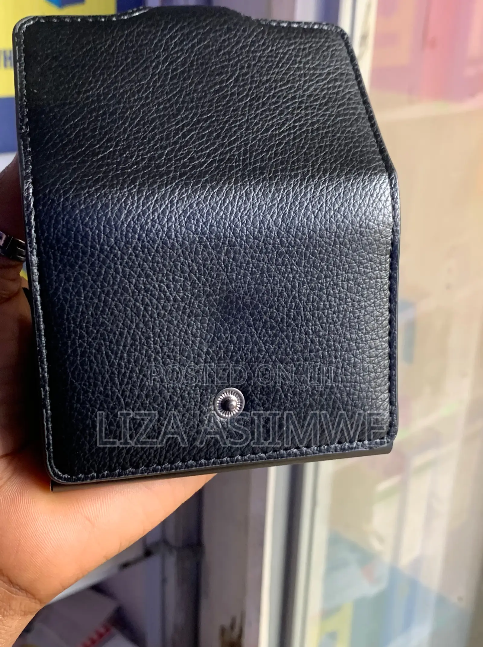 Compact Leather Cardholder or Wallet With a Snap Closure