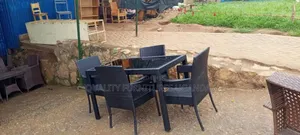 Tinted Glass Rattan Dining Table