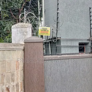 Electric Fence With Razorwire450mm. Uganda