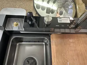A Multifunctional Nano-Black Smart Kitchen Sink With a Digital Display