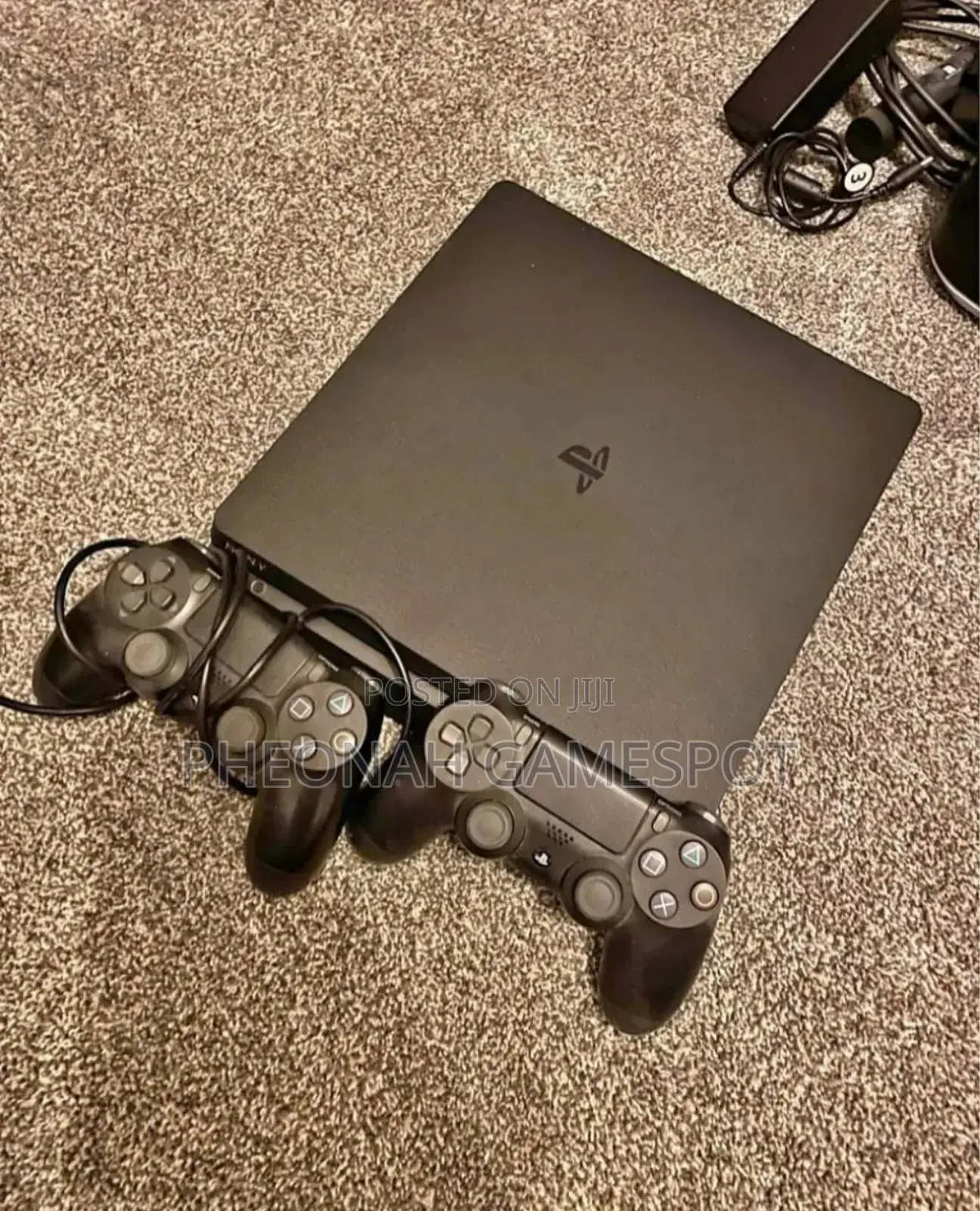 Playstation 4 Slim Console: Compact, Powerful, and Ready for Action.