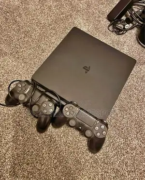 Playstation 4 Slim Console: Compact, Powerful, and Ready for Action.