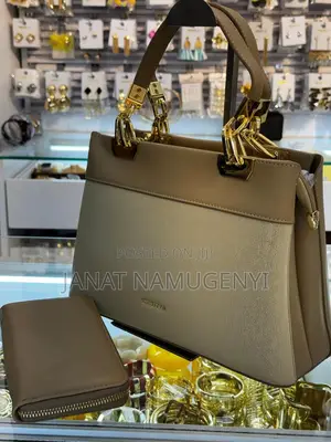 Chris Bella Bag With Golden Handle and a Wallet