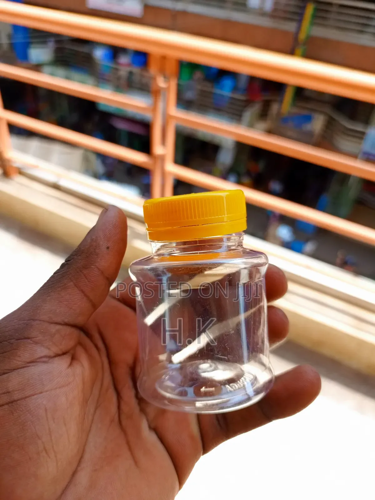 120ml Disposable Clear Plastic Bottle With a Yellow Screw-on Lid 1