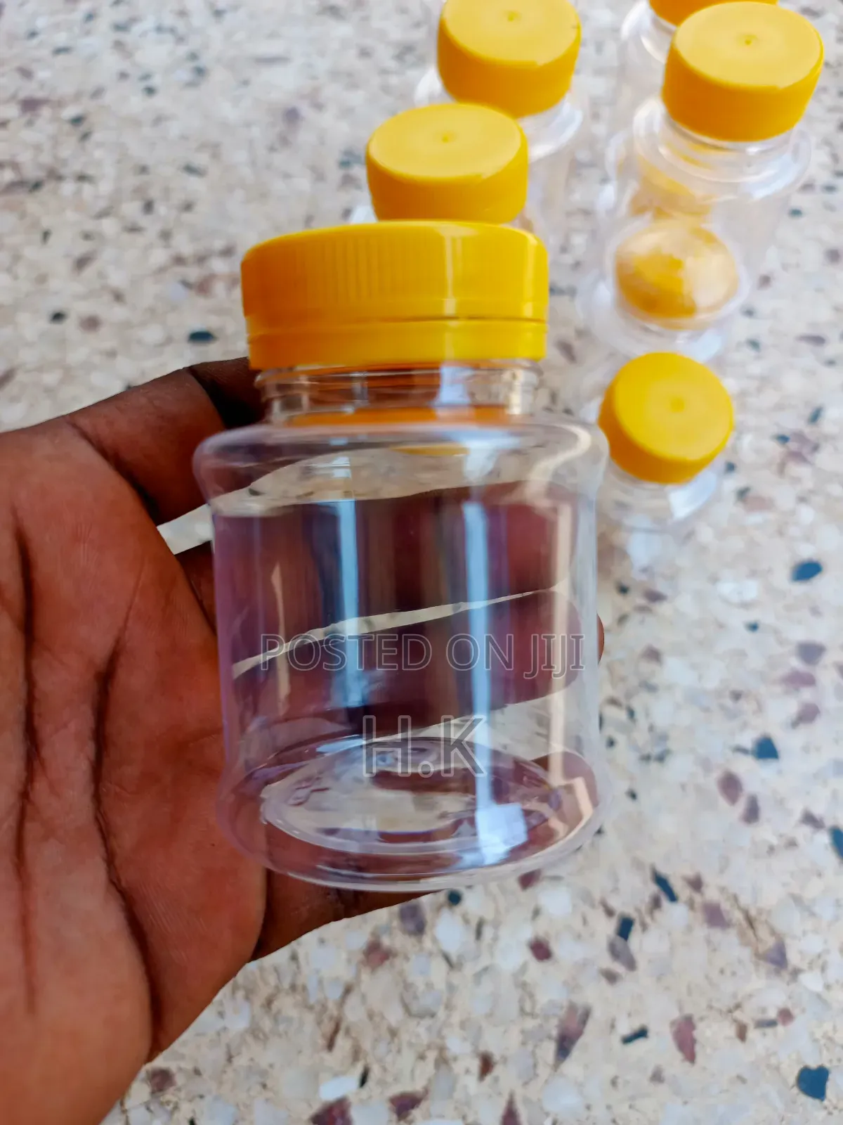 120ml Disposable Clear Plastic Bottle With a Yellow Screw-on Lid 1
