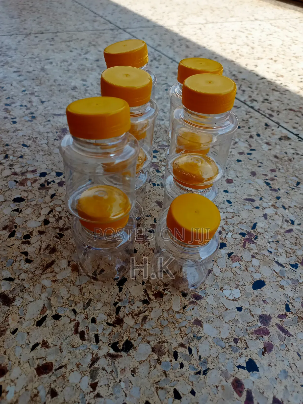 120ml Disposable Clear Plastic Bottle With a Yellow Screw-on Lid 1