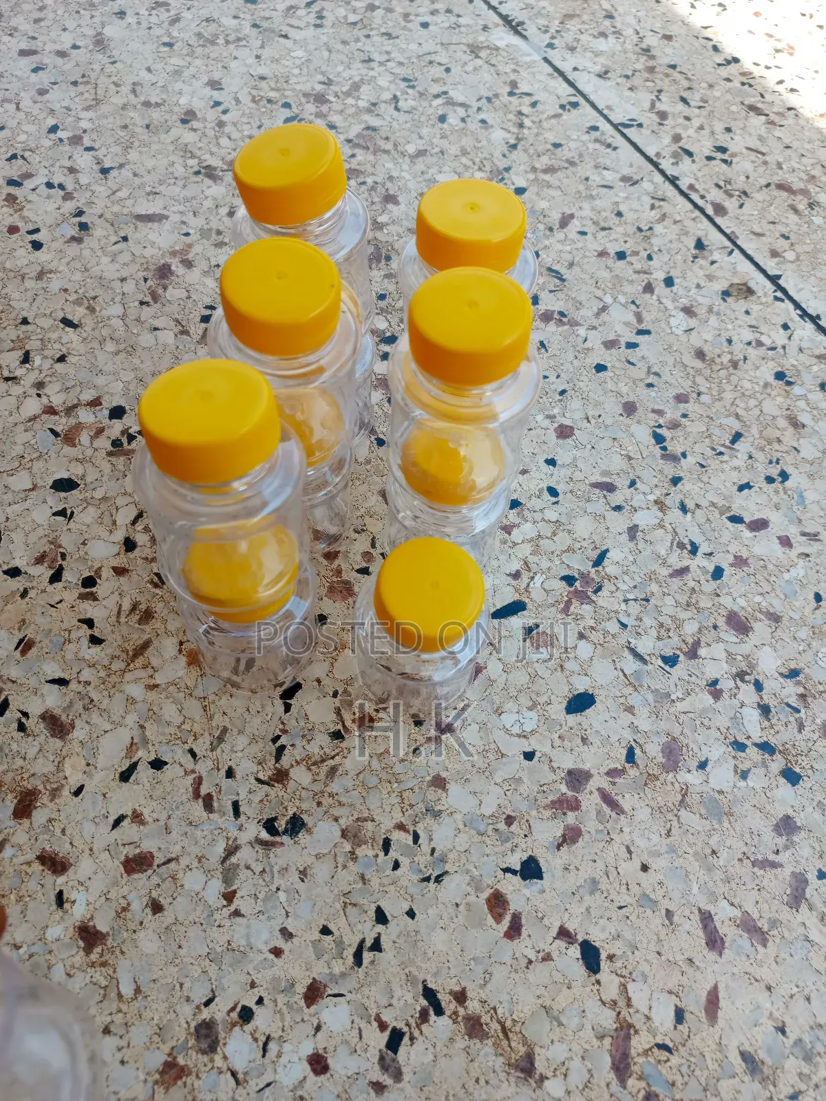 120ml Disposable Clear Plastic Bottle With a Yellow Screw-on Lid 1
