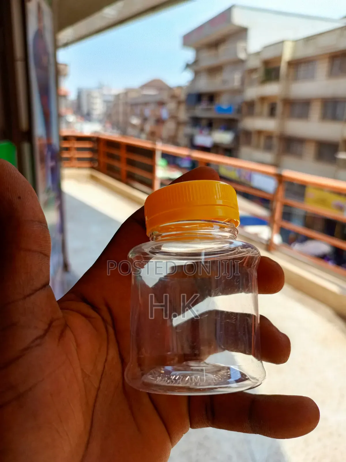 120ml Disposable Clear Plastic Bottle With a Yellow Screw-on Lid 1