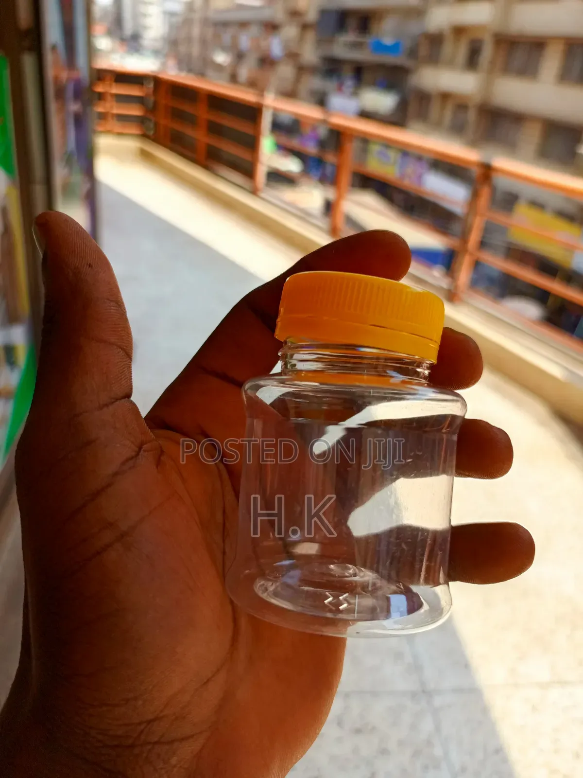 120ml Disposable Clear Plastic Bottle With a Yellow Screw-on Lid 1