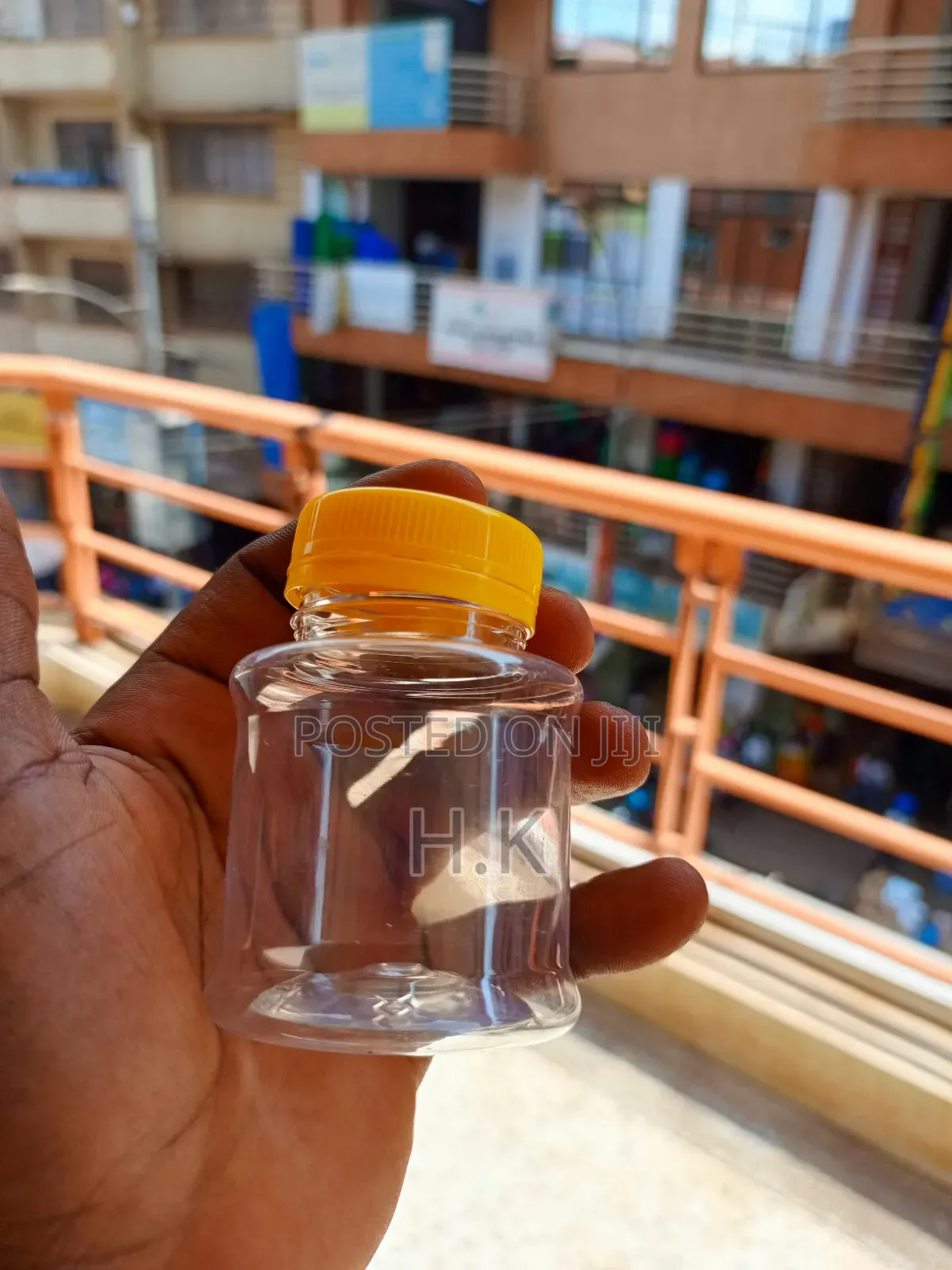 120ml Disposable Clear Plastic Bottle With a Yellow Screw-on Lid 1