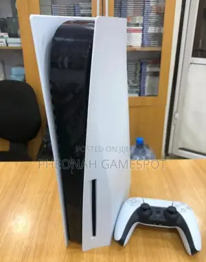 Used Playstation 5 Standard Ready to Play With 2 Controllers + 2 Games