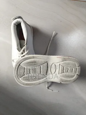 Used Size 21 White Cosmos Shoes