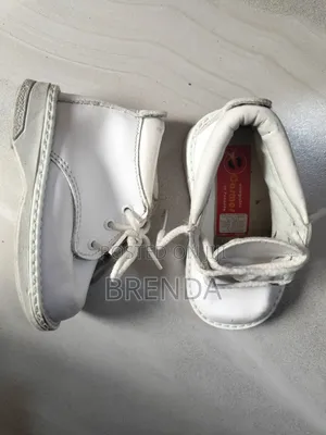 Used Size 21 White Cosmos Shoes