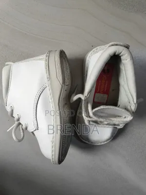 Used Size 21 White Cosmos Shoes