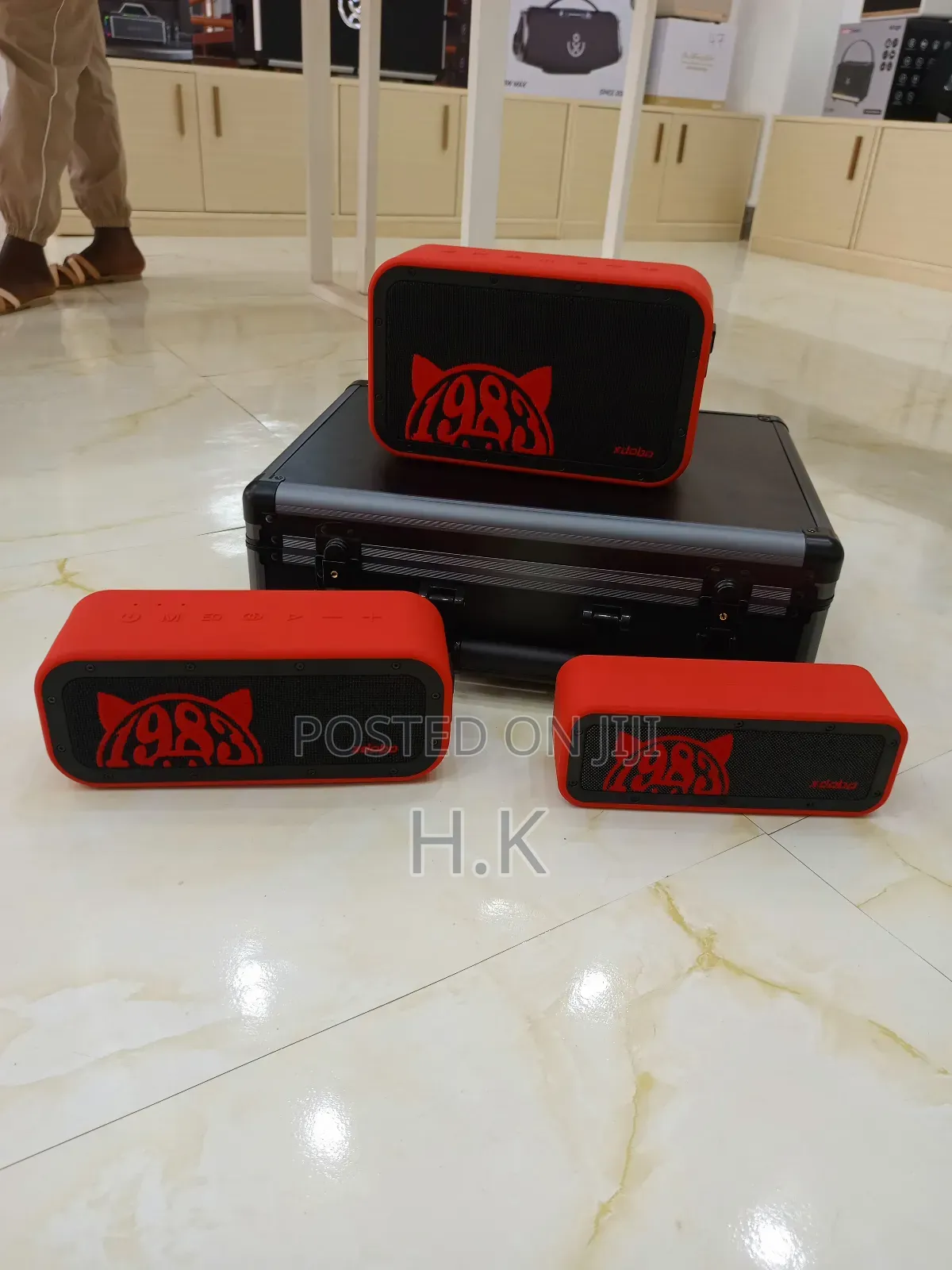 Xdobo 1983 Series Portable Bluetooth Speakers and a Carrying Case.