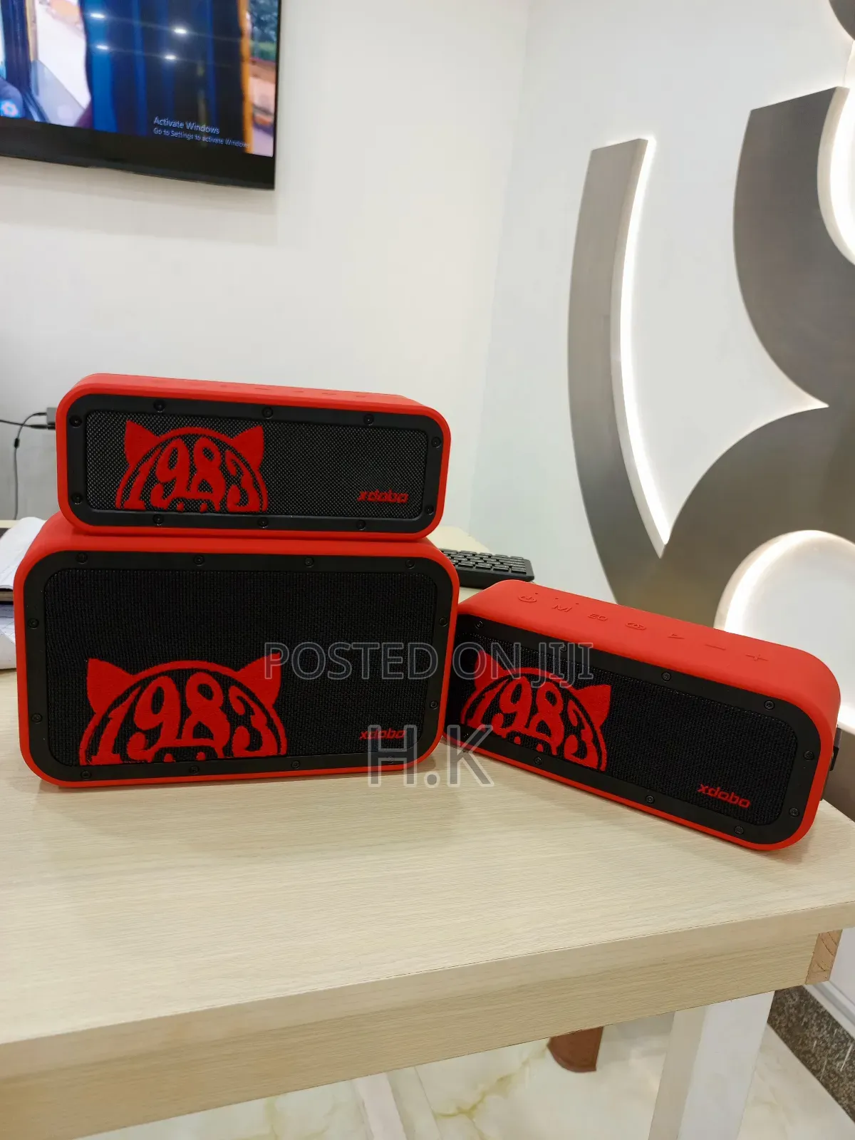 Xdobo 1983 Series Portable Bluetooth Speakers and a Carrying Case.