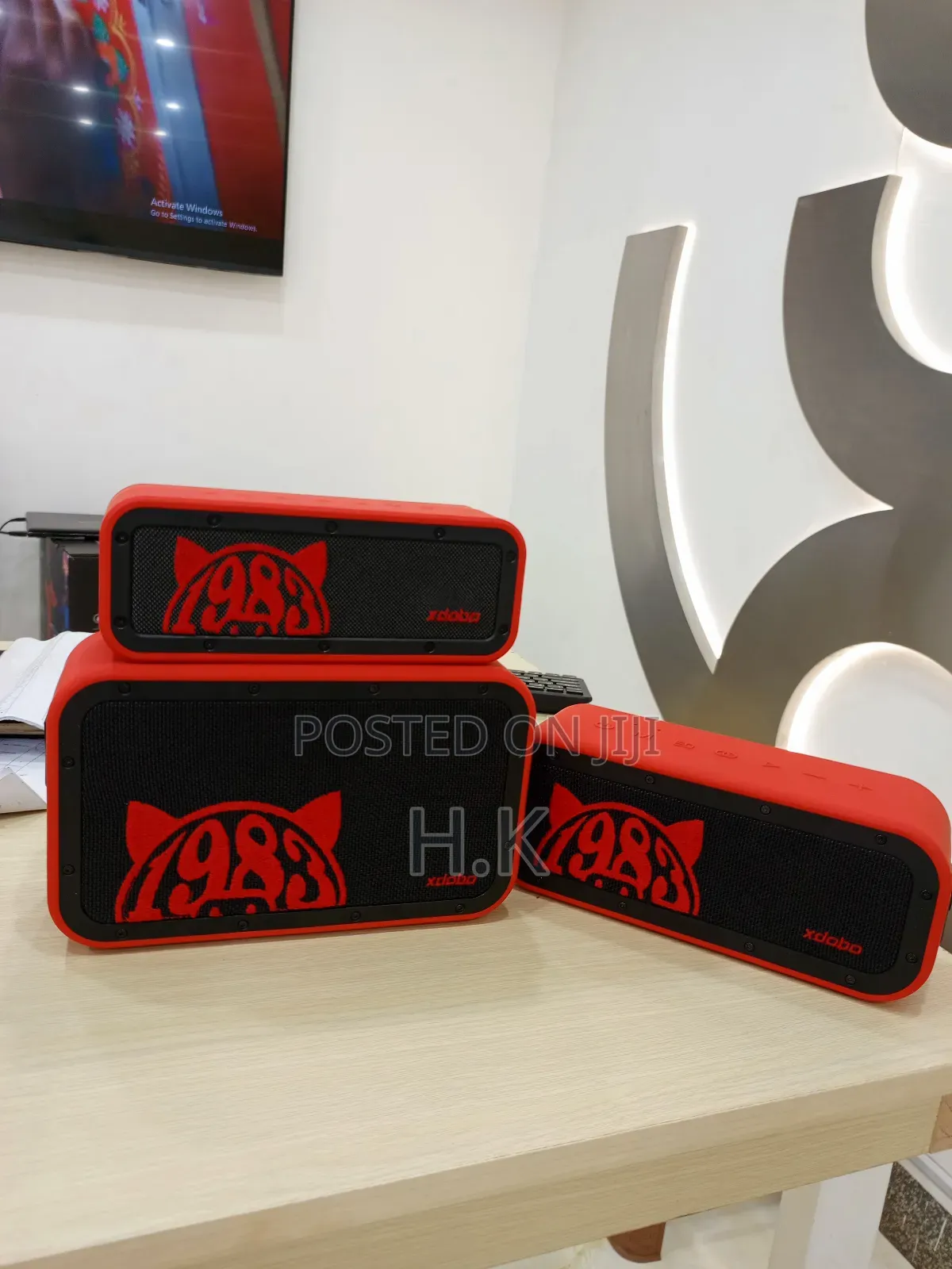 Xdobo 1983 Series Portable Bluetooth Speakers and a Carrying Case.