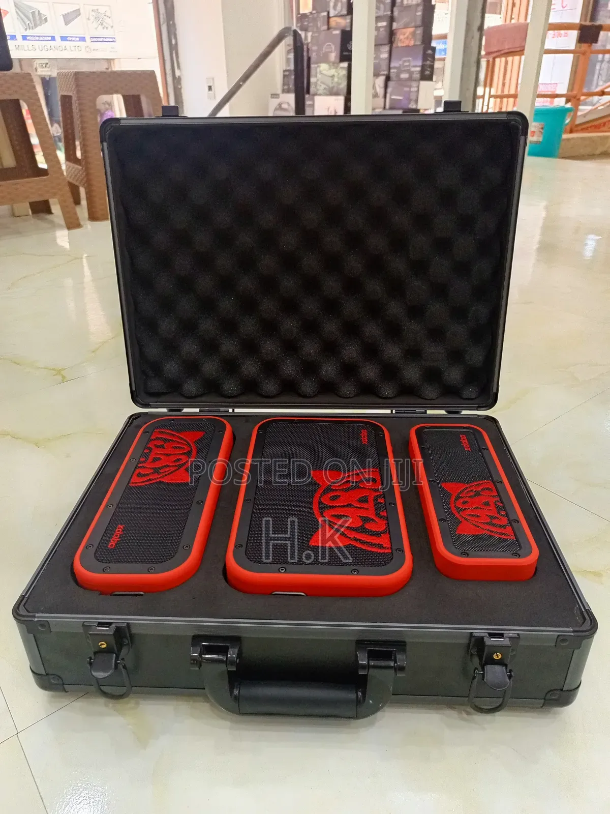 Xdobo 1983 Series Portable Bluetooth Speakers and a Carrying Case.