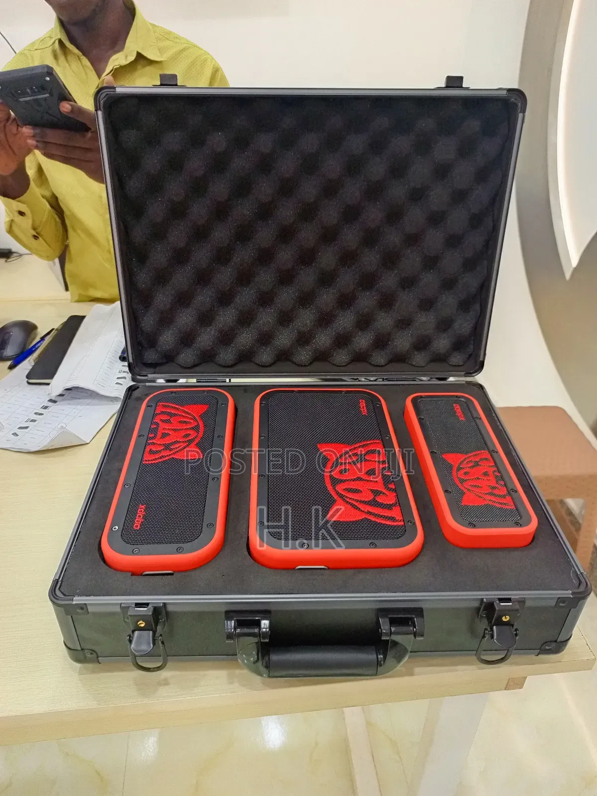 Xdobo 1983 Series Portable Bluetooth Speakers and a Carrying Case.