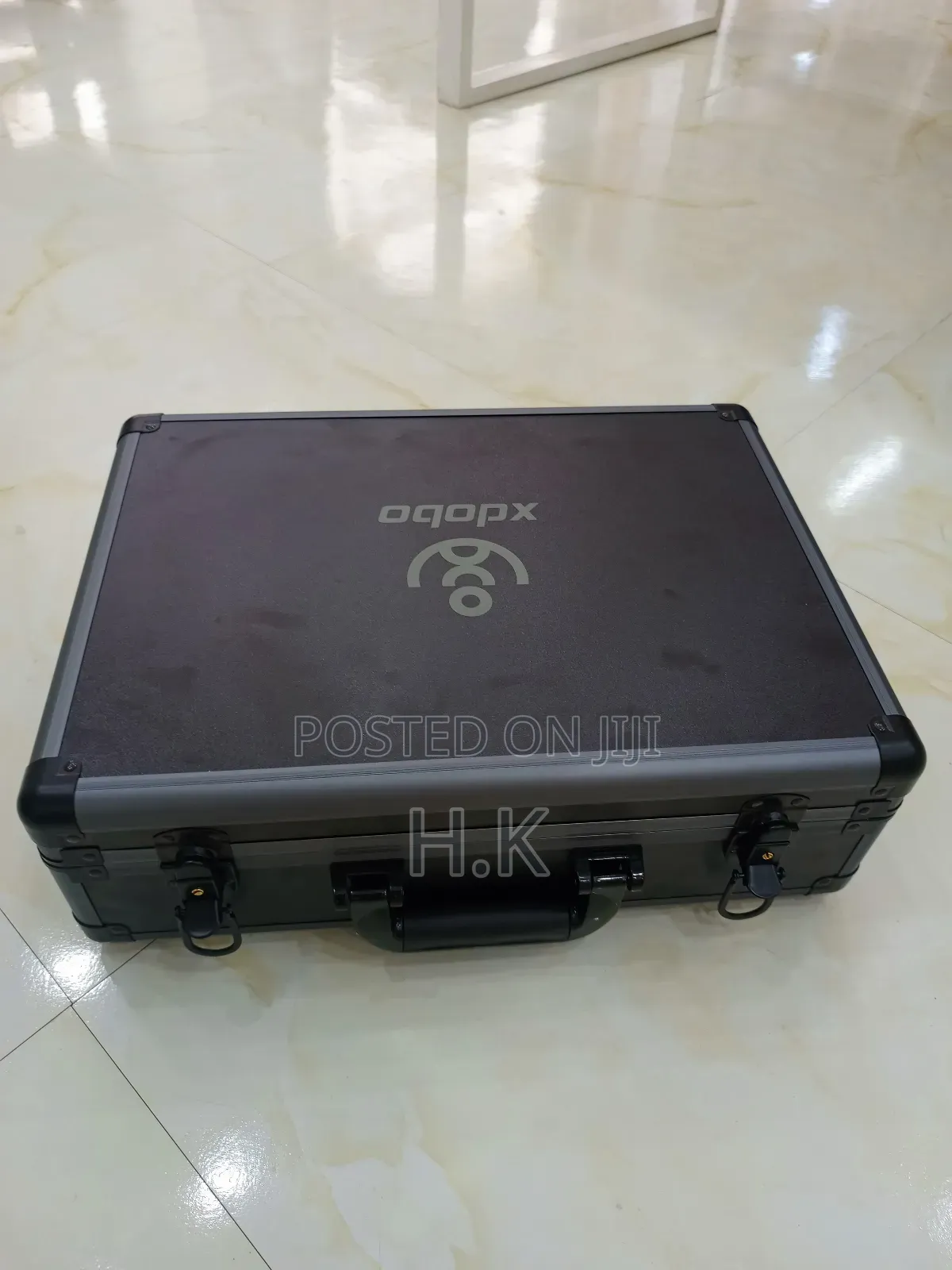 Xdobo 1983 Series Portable Bluetooth Speakers and a Carrying Case.