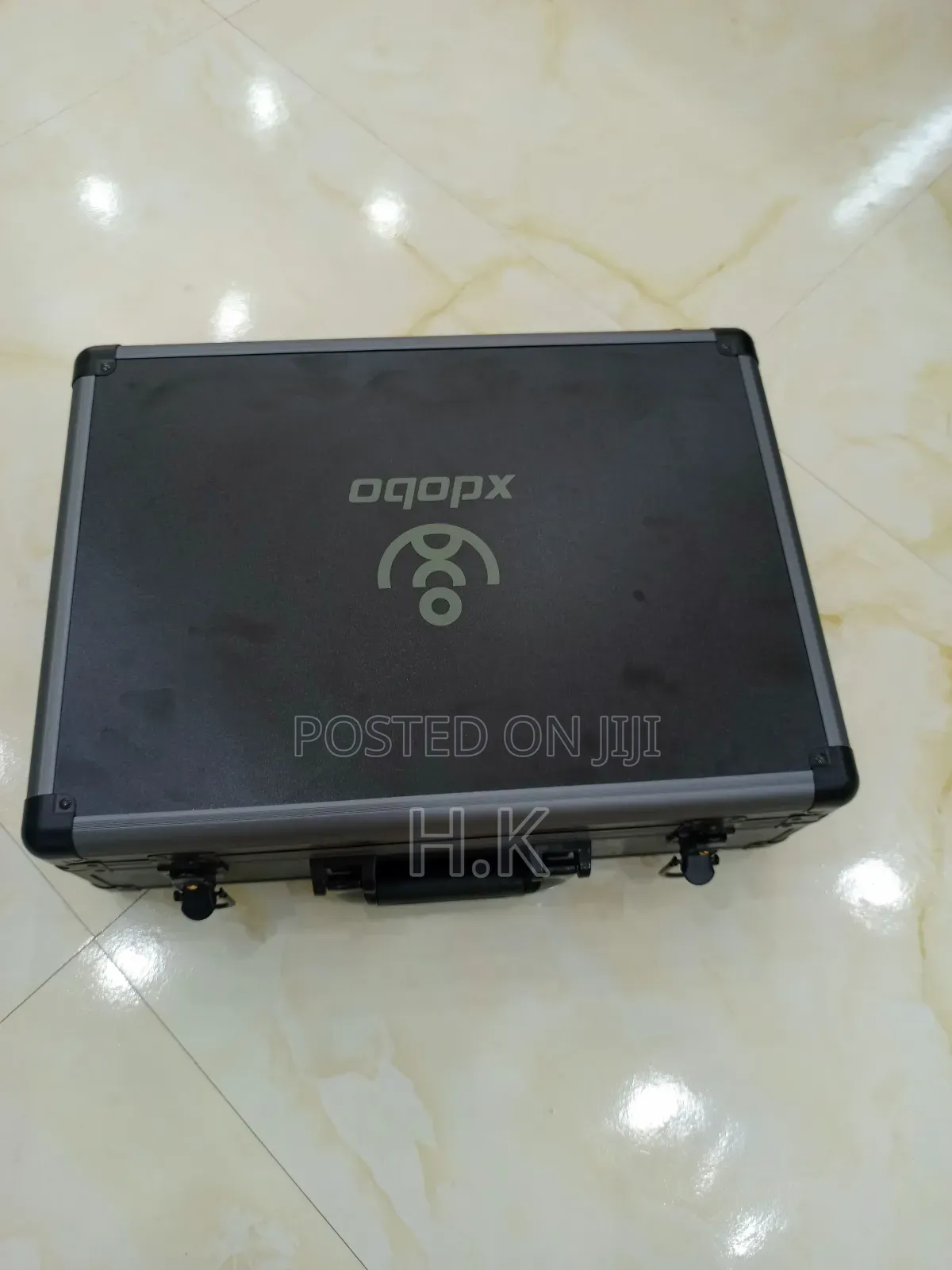 Xdobo 1983 Series Portable Bluetooth Speakers and a Carrying Case.