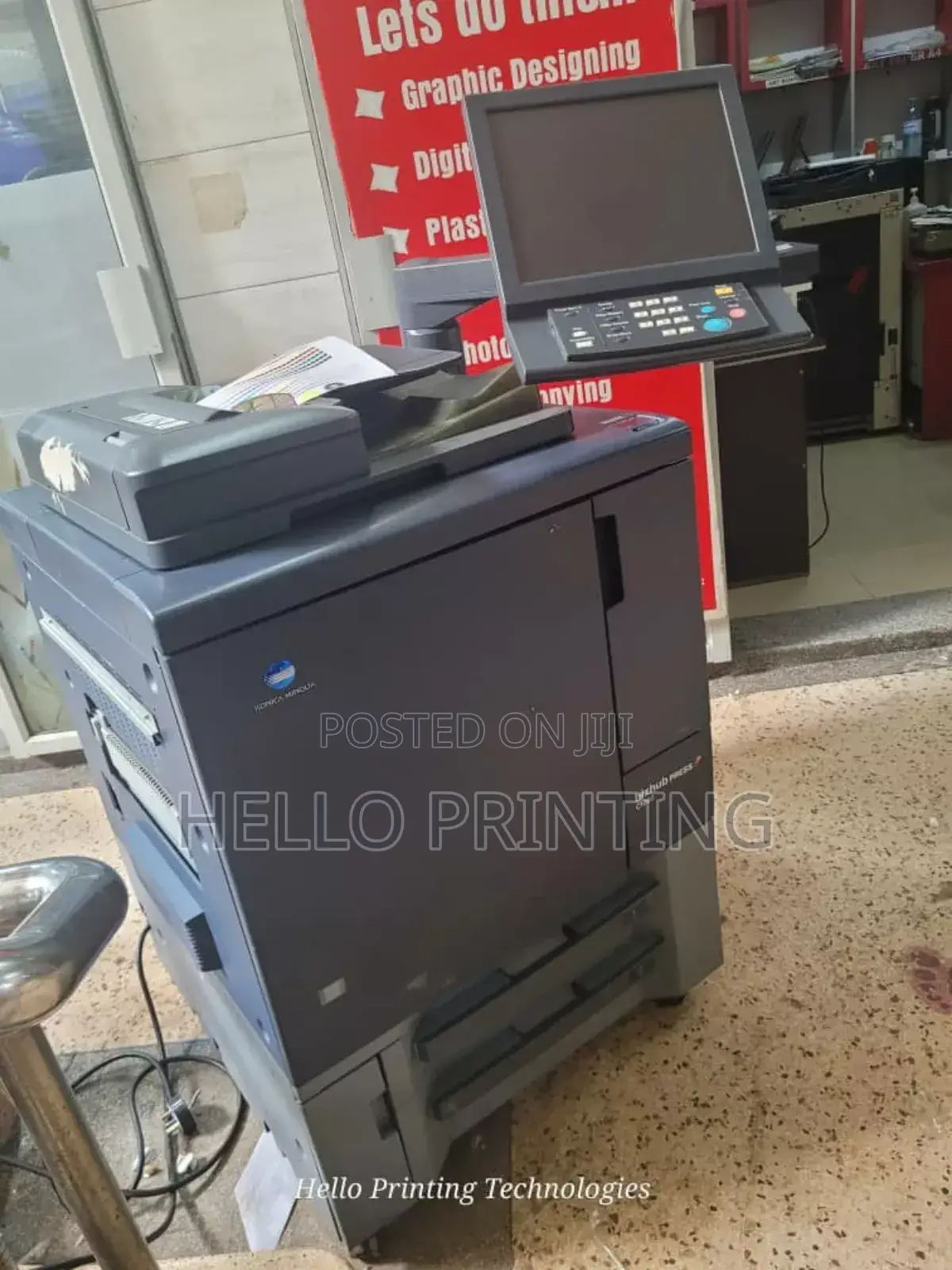 "Retail Ready : Konica C1060 Press.